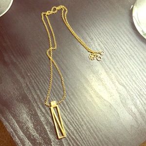 Long pendent gold necklace